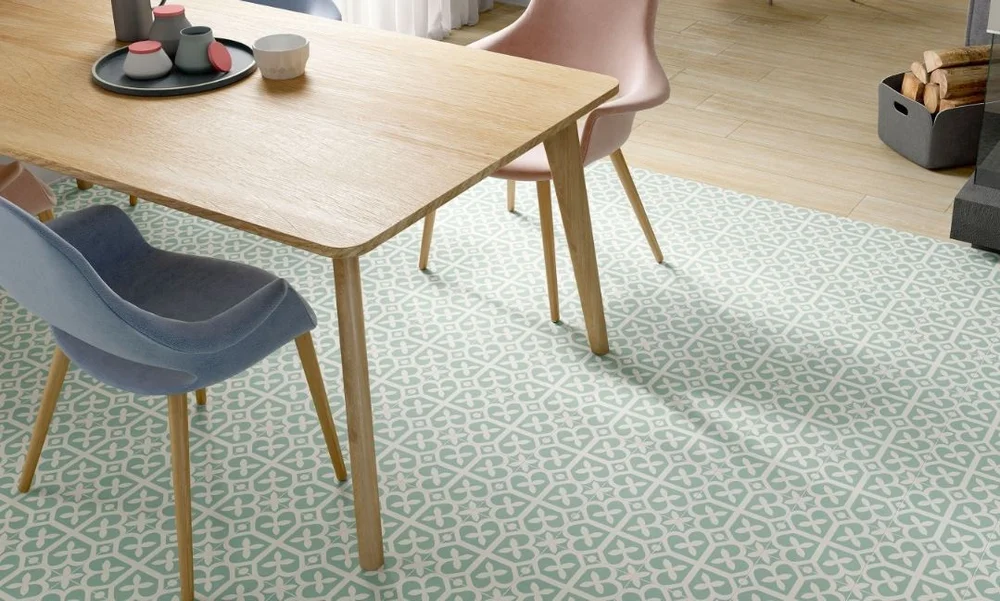 Dining area with a patterned floor from the Deco Anthology series