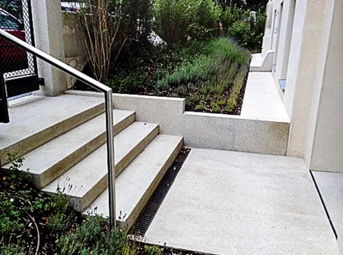 Steps and terrace in light natural stone
