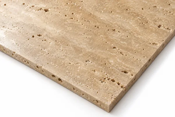 Materialstudie: Travertin mit offenen Poren, geschliffen, gerade scharfe Kante